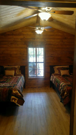 Cypress log private cabin lodging